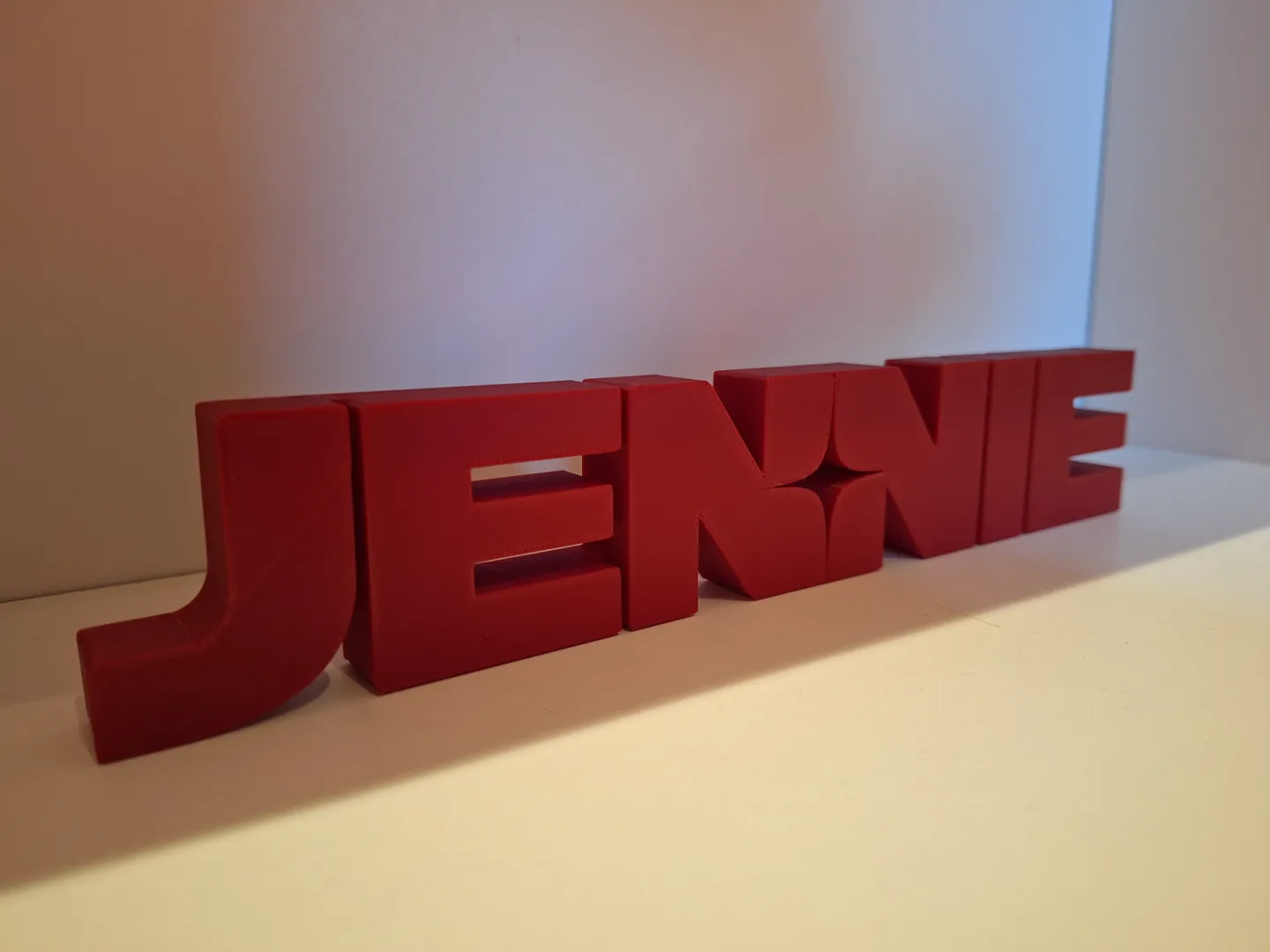 JENNIE Logo Decorativo